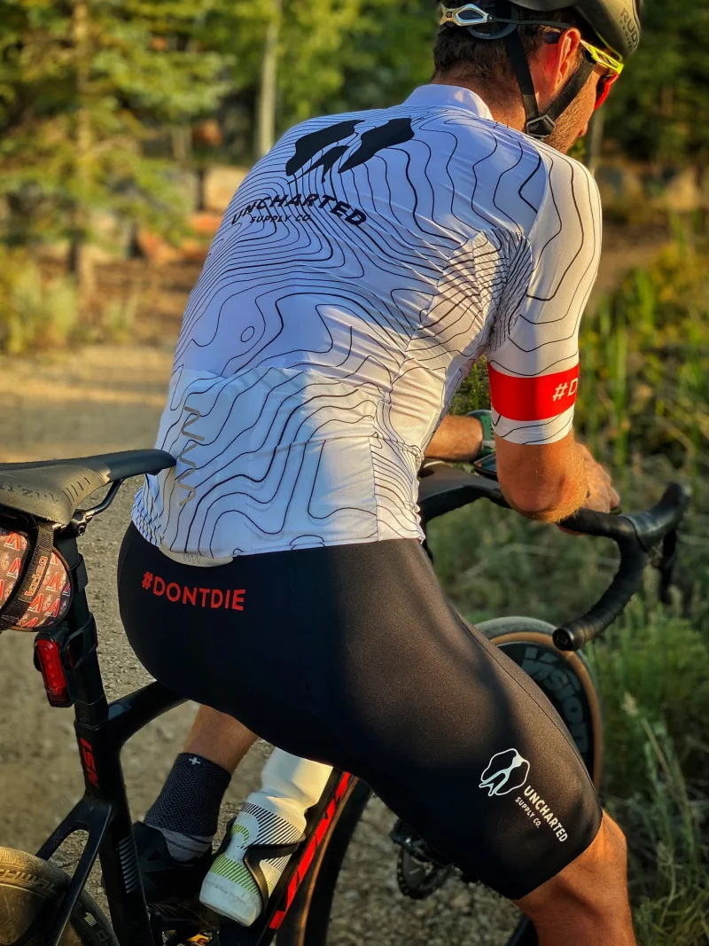 White - Uncharted Supply Co Team Cycling Jersey by Wyn Republic