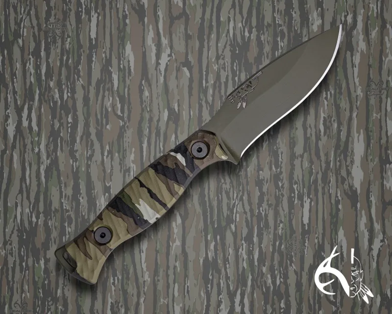 The 86' (HFB x Realtree) - Realtree Original Camo Hydro-dipped Micarta, Sniper Green Cerakote, Allen Bolts, Textured Grip.