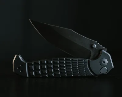 Crow Folder- Anodized Black Frame, Nitride Black Blade, Grenade Stippled Grip, Deep Carry Pocket Clip