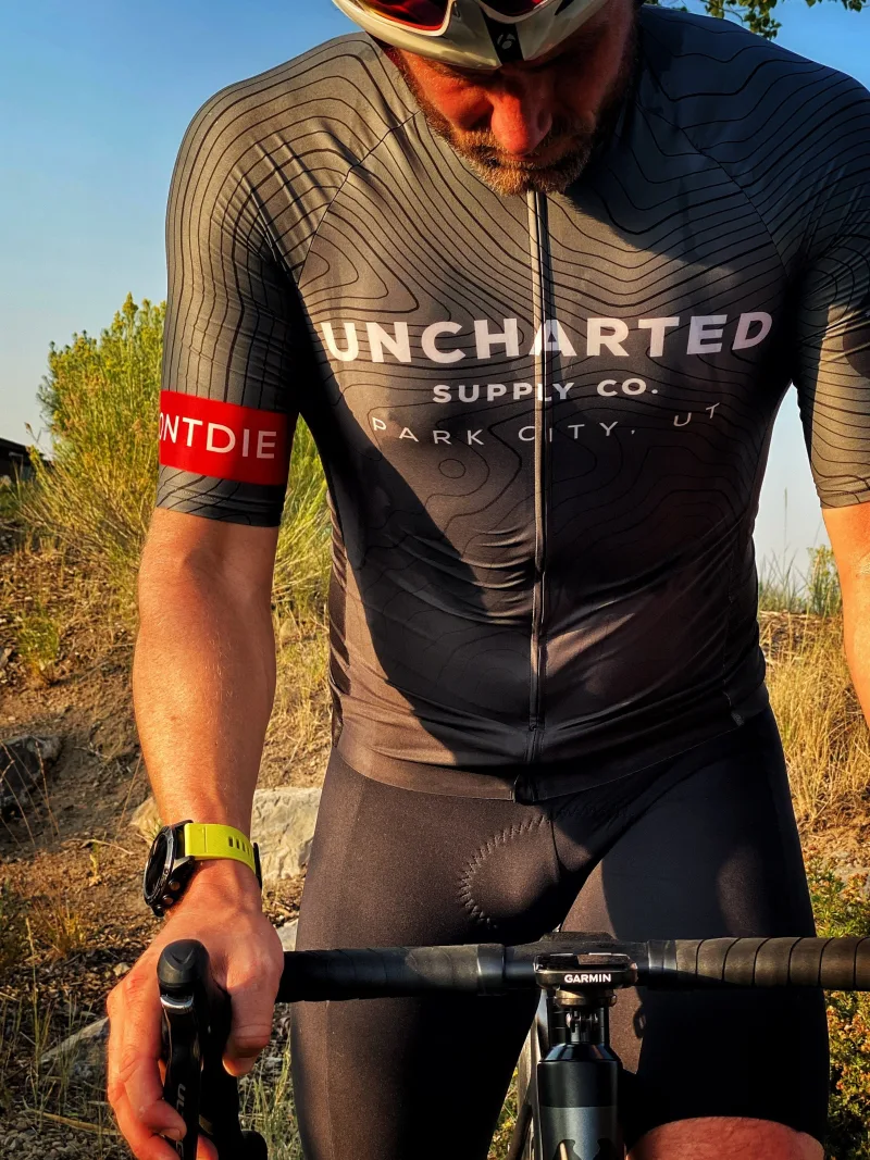 Black - Uncharted Supply Co Team Cycling Jersey by Wyn Republic